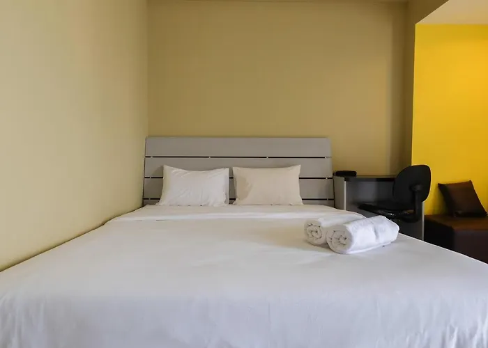 Modern And Comfy Studio Tamansari Sudirman Apartment By Travelio