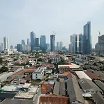 Modern And Comfy Studio Tamansari Sudirman Apartment By Travelio